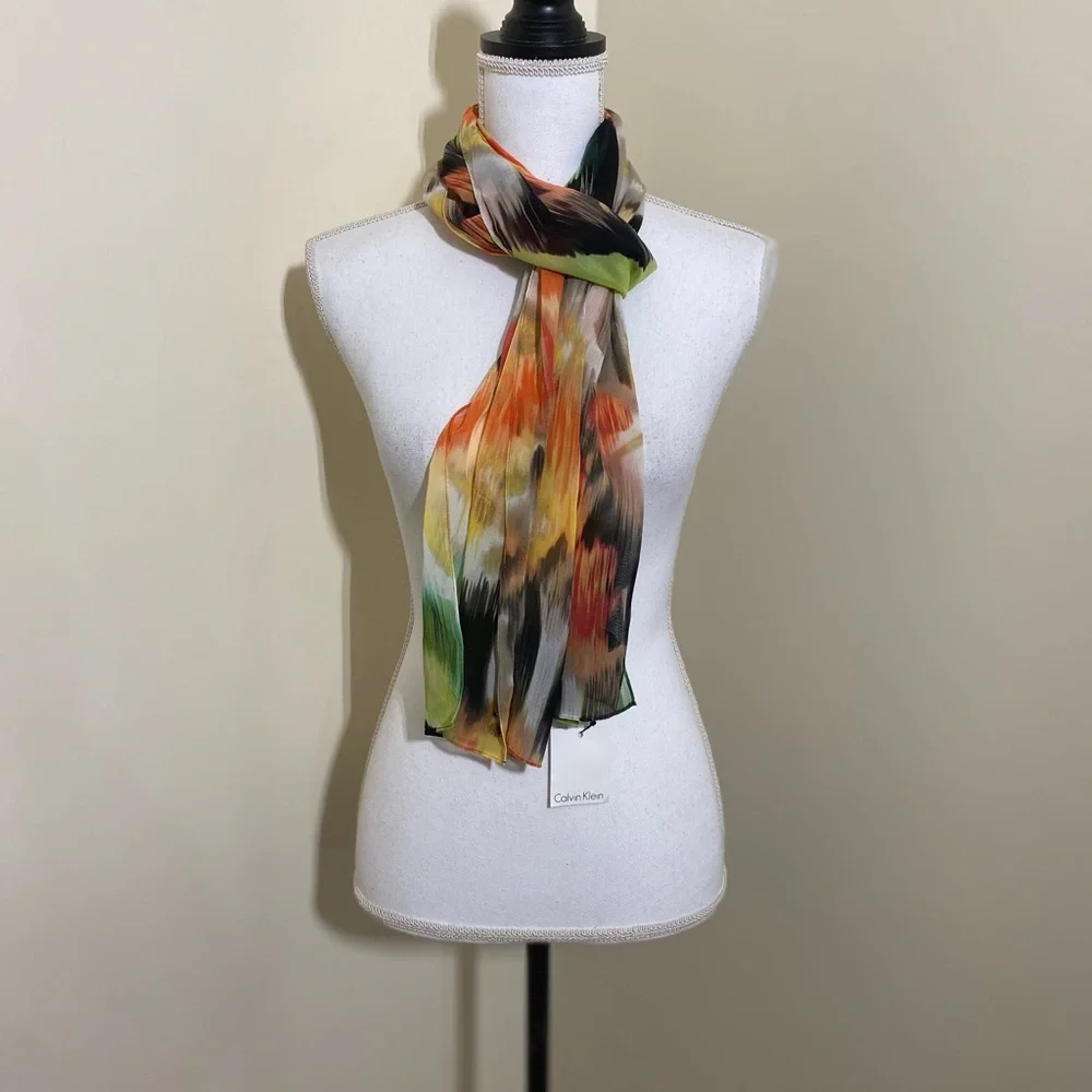 NWT Calvin Klein || woman’s multicolor scarf .L70”W14”